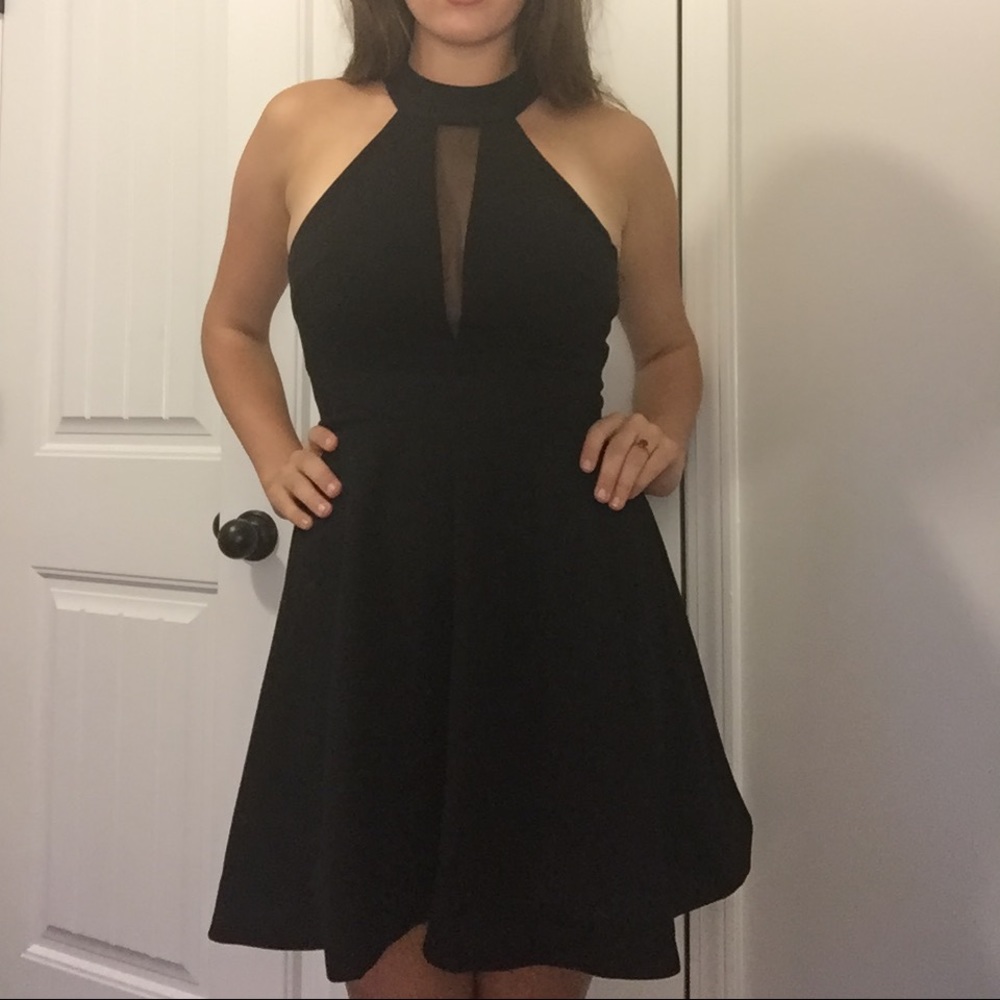 Black backless dress with sheer neckline